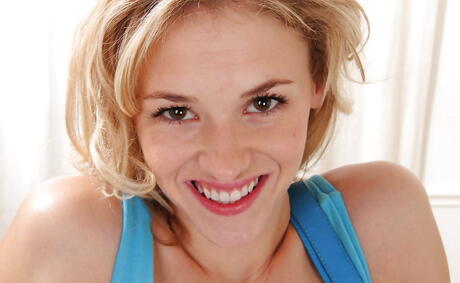 Foxy blonde teen Phoebe Jones bares her butt in hot underwear and spreads her legs 